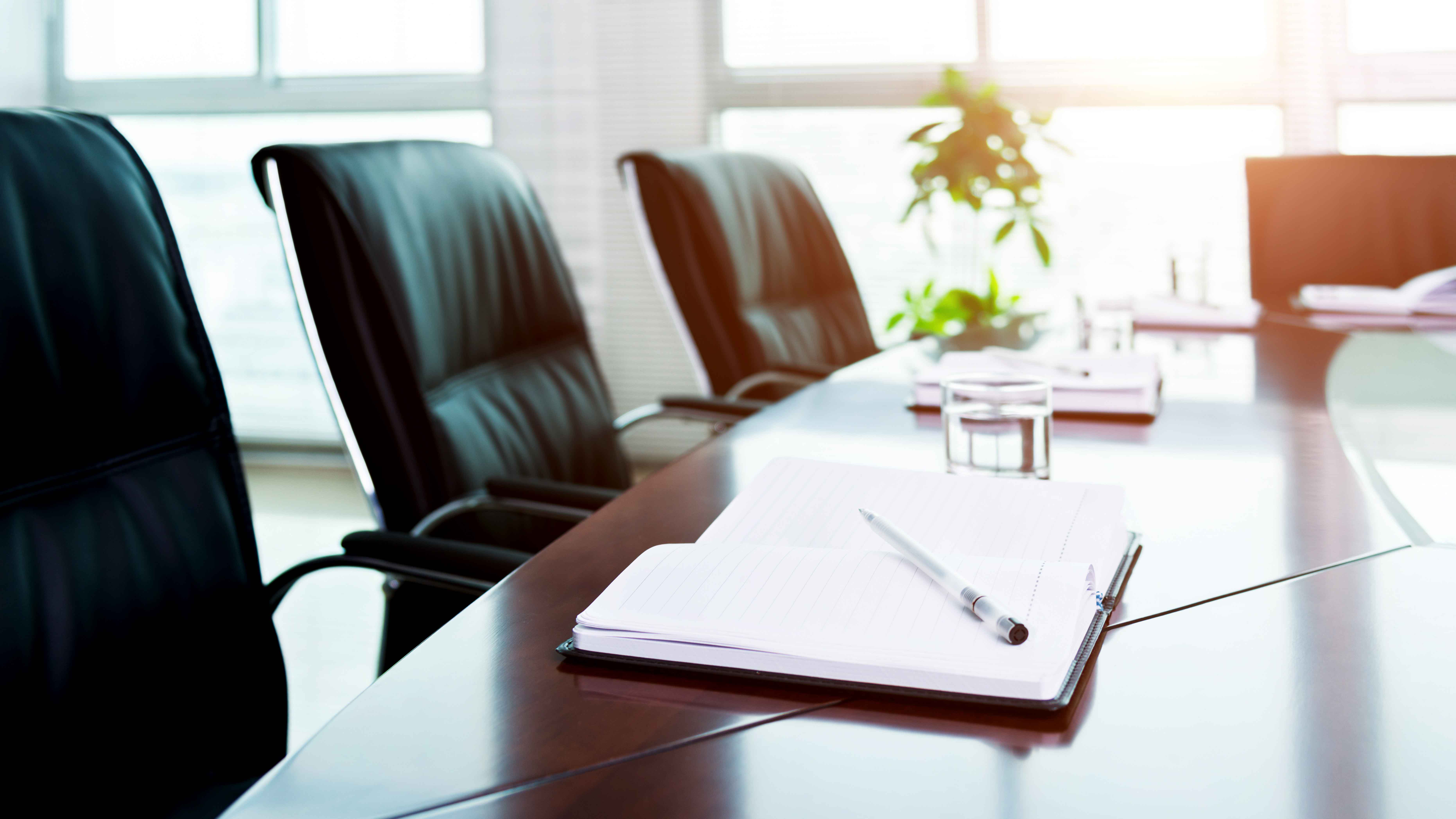 A photograph of a conference table.