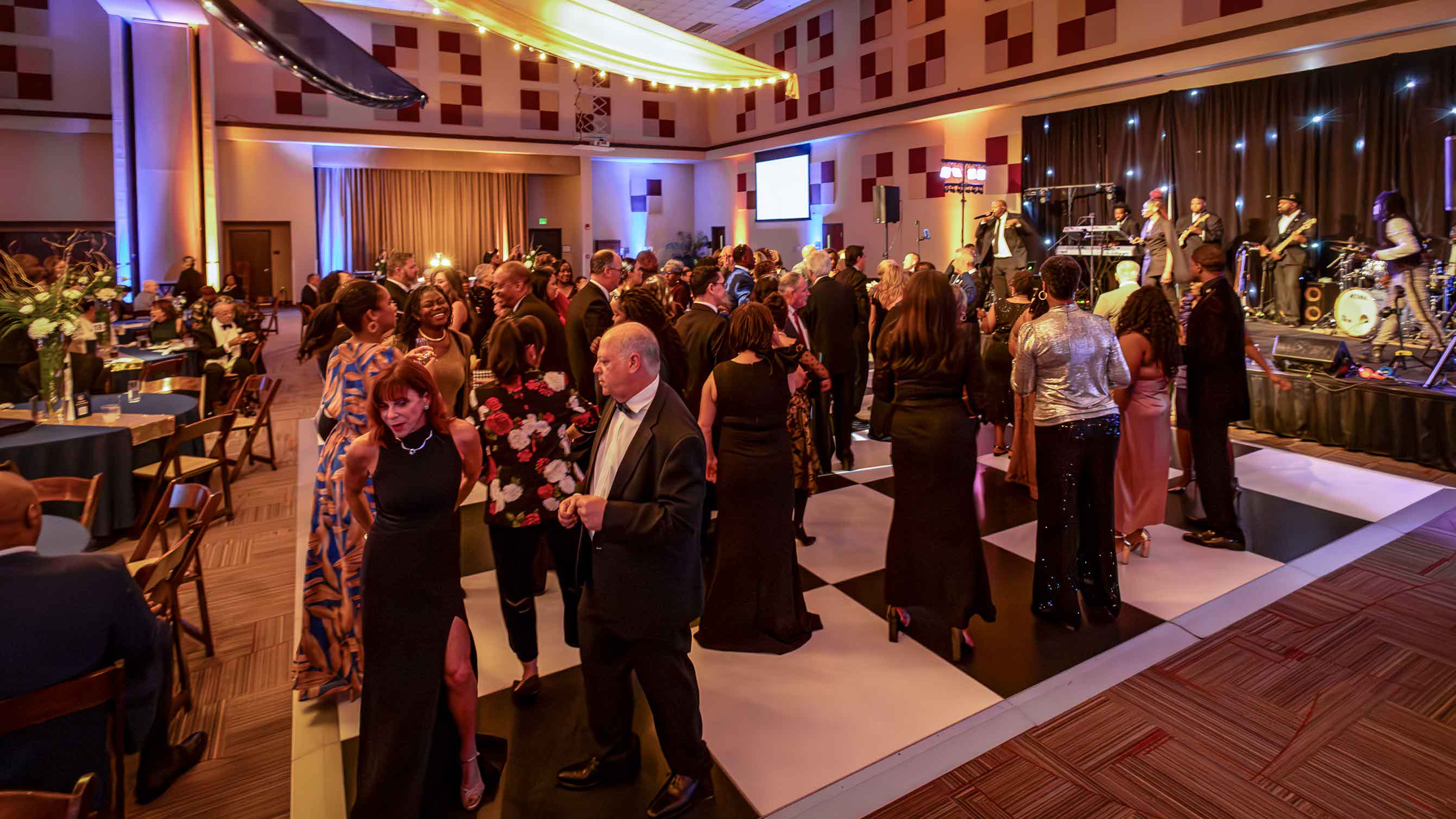 People on the dance floor at the Legacy Ball.