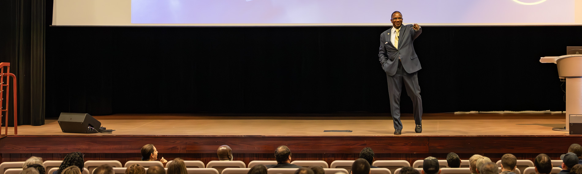 Dr. Ford speaking to the staff in the SiMT auditorium.