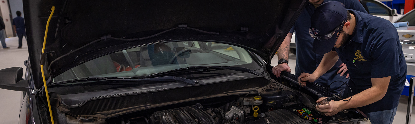 Florence-Darlington Technical College automotive student works to repair an automobile during class
