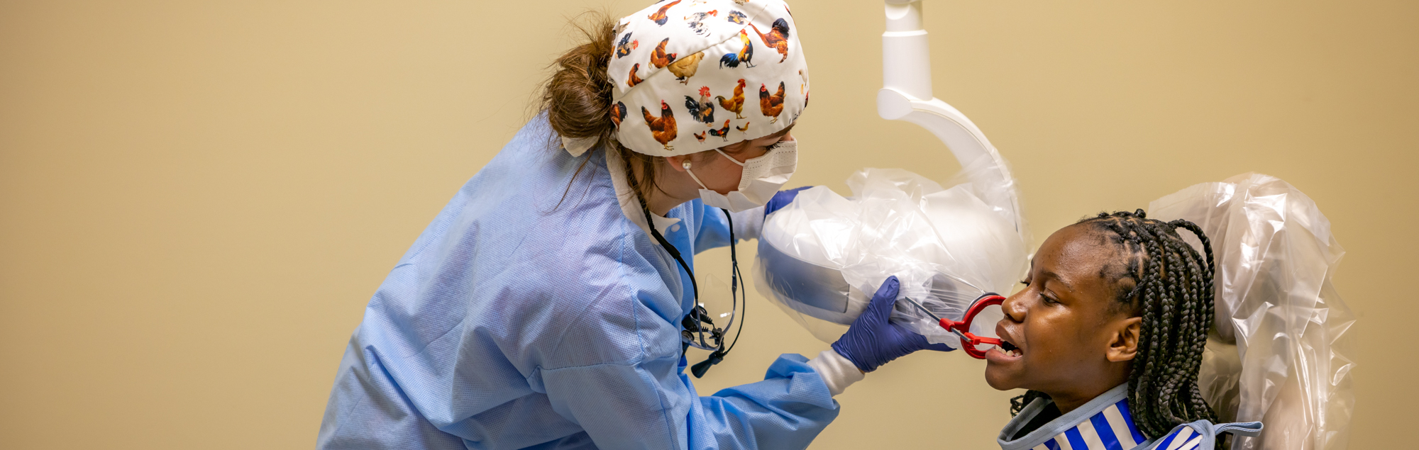 An expanded duty dental assisting student practices dental techniques in the dental hygiene lab