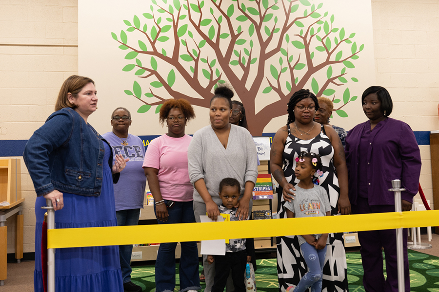 A group of people at the fdtc library childrens section opening