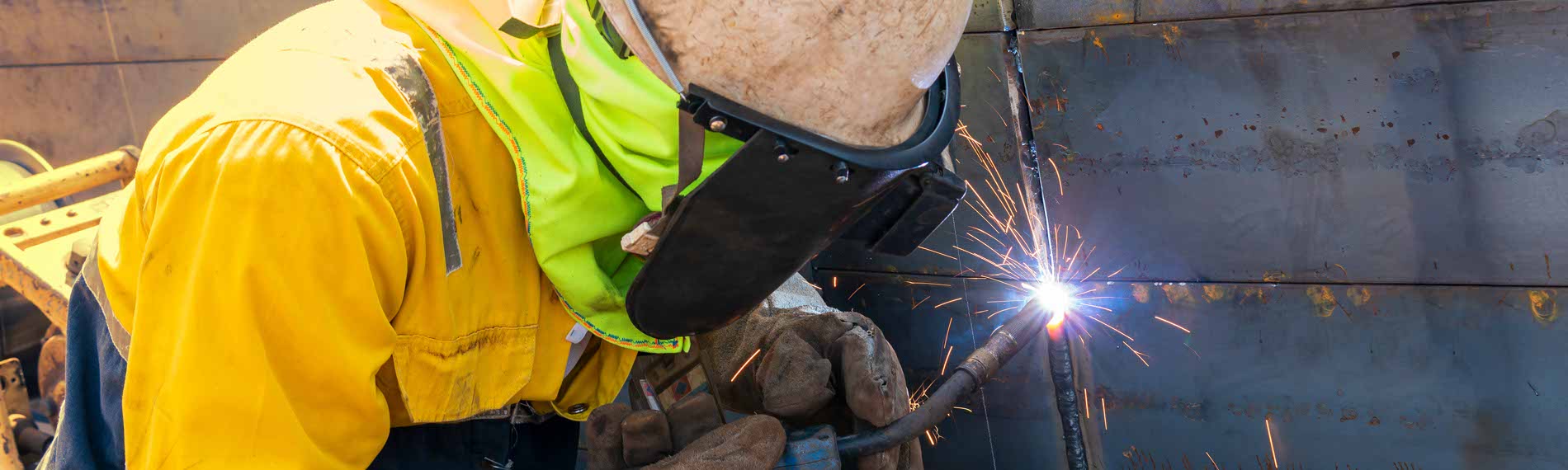 A welder working with Flux Core.